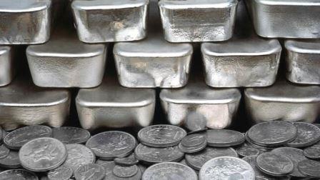 plata lingotes monedas
