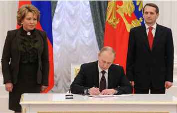 Putin firma ley adhesion Crimea